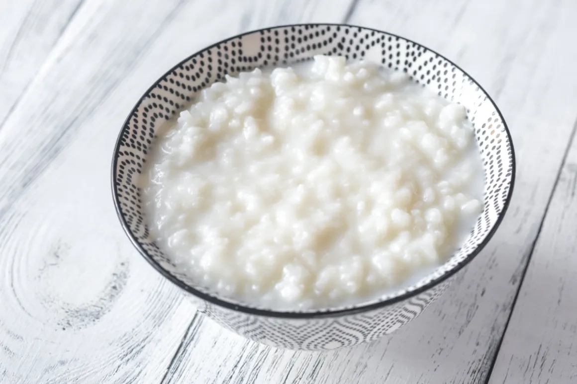 Bowl of congee on a wooden surface