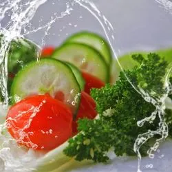 Fresh sliced ​​vegetables splashed with clear water