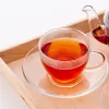 A cup of tea on a wooden tray