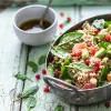 A bowl of salad with fresh vegetables