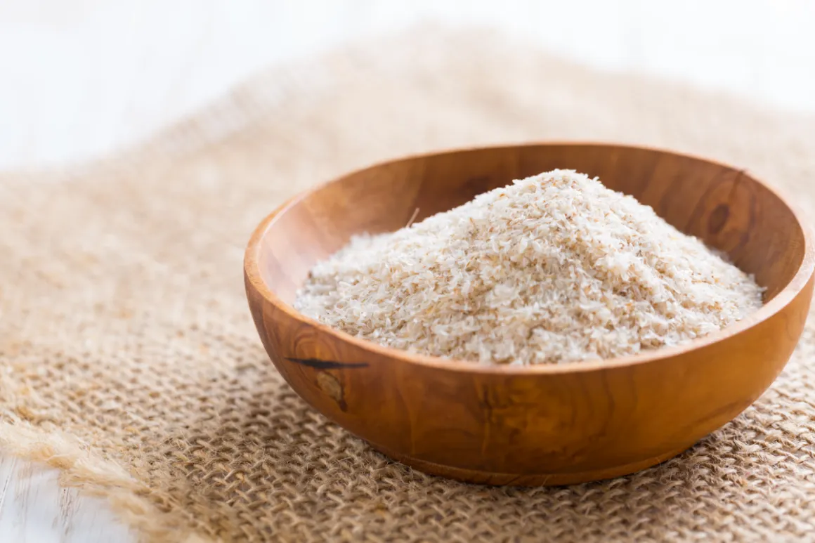 Psyllium husks in a wooden bowl