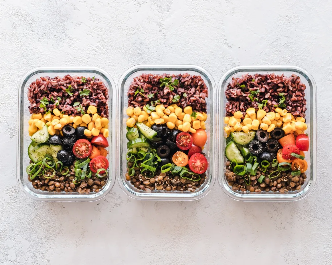 Three bowls with vegetarian meals